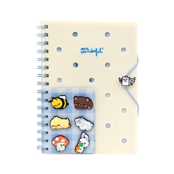 Caderno A5 com charms decorativos e capa de silicone".