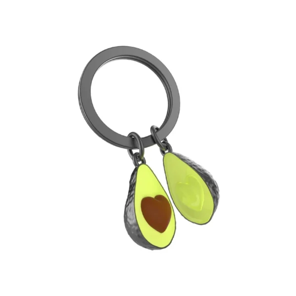 Compre o porta chaves abacate da marca meta[l]morphose. Design premium em metal fundido com caroço de coração e pintura esmaltada. Garanta o seu amuleto exclusivo!