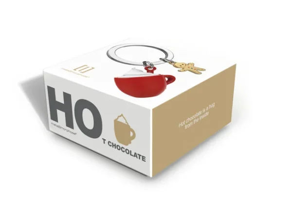 A embalagem original de cartão protege o Porta-chaves Chocolate Quente com Caneca e Biscoito Metalmorphose no seu interior. Além disso, a caixa de oferta apresenta uma janela transparente que deixa ver o Porta-chaves Chocolate Quente com Caneca e Biscoito Metalmorphose com total clareza.